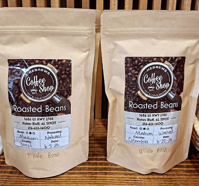 Two 12 oz bags of Hebrews roasted beans with handwritten roast labels